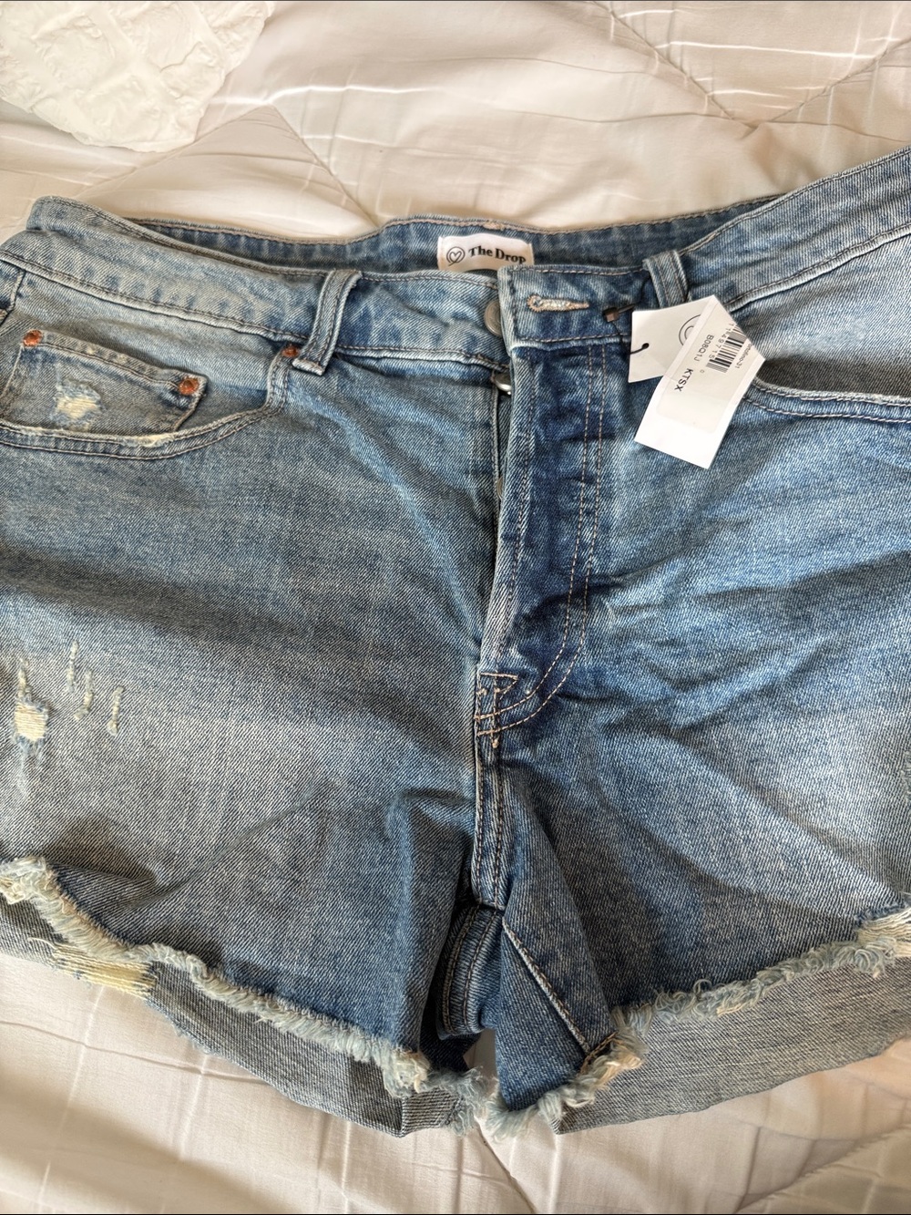 Light Blue Distressed Denim Cutoff Shorts